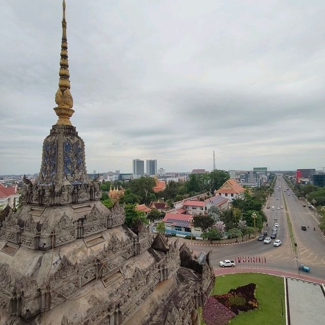 Ascending to Elegance: Patuxay's Embrace Above Vientiane