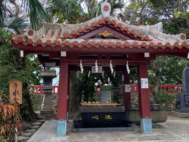 A majestic shrine standing on the blue sea
