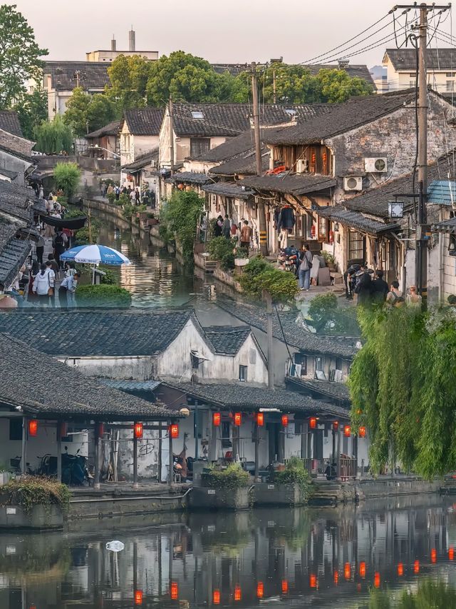 坐完烏篷船,再去食碗酒釀圓子 坐完烏篷船,再去食碗酒釀圓子