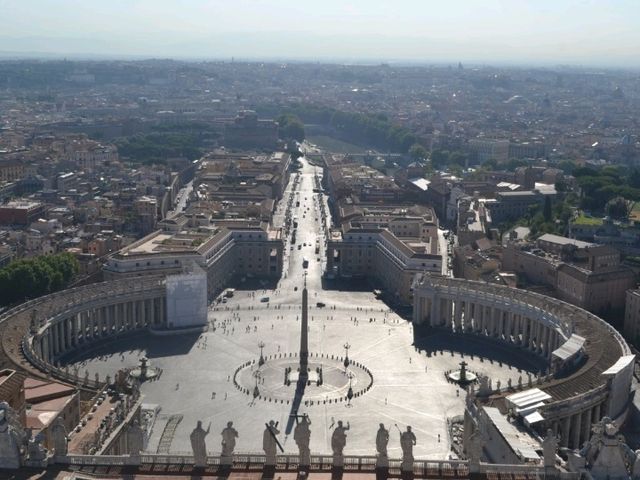 The symbol of the Holy See, Saint Peter's Square and Basilica