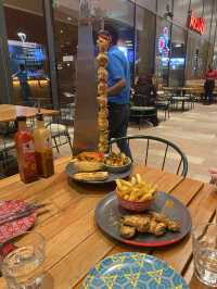 Stopover in Doha and Dinner at Nandos in Lusail