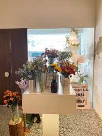 Cafe with beautiful fresh flowers in store, Penang