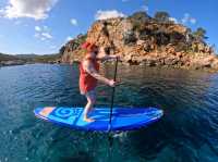Paddleboarding and cliff jumping at secret caves in Ibiza