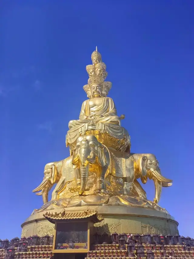 Mount Emei, Sichuan | The sun rises in the east and the golden summit is bathed in Buddha's light. 