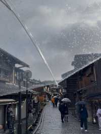 First Snowfall at Kiyomizudera: A Magical Winter Scene with Rainbow and Sunset