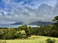 Cliffs, clouds, and colors: a rainbow at Tasman National Park Lookout