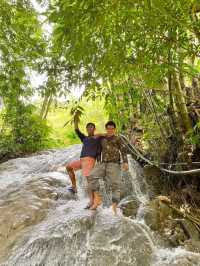 A Picturesque Two Tiered Waterfall located in the Lush of Hill in Alegria