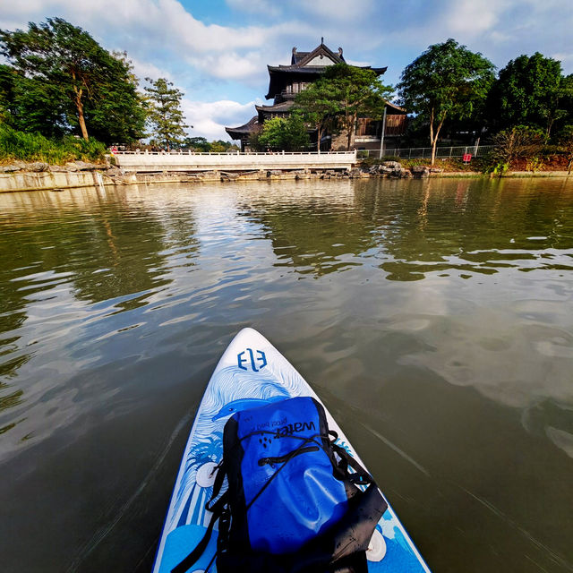 Glide & Gaze: Paddleboarding Bliss at Haizhu Lake Park 🏄‍♂️🌇