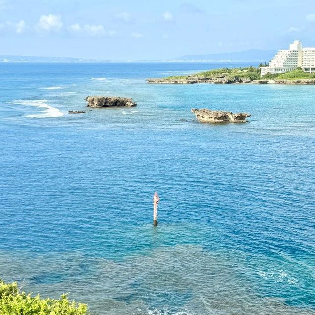 Cape Manzamo: Okinawa’s Dramatic Cliffside Wonder – A Solo Traveler’s Coastal Escape"** 🌊🗿