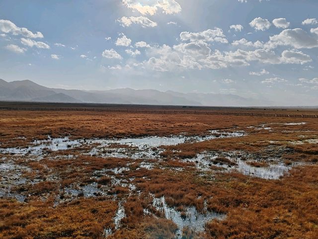 Autumn Wetlands and Snow-Capped Peaks Reflecting Each Other in Taxkorgan