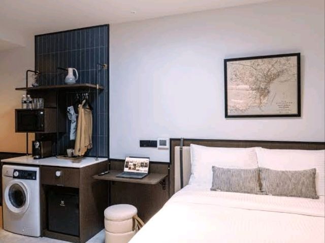 Interiors are clean, minimalist, and smart, featuring comfortable bedding, smart TVs, and en-suite