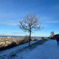 Carlton hill Edinburgh snow , night and day view up in a mountain 