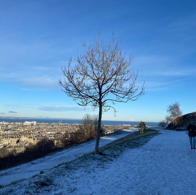 Carlton hill Edinburgh snow , night and day view up in a mountain 