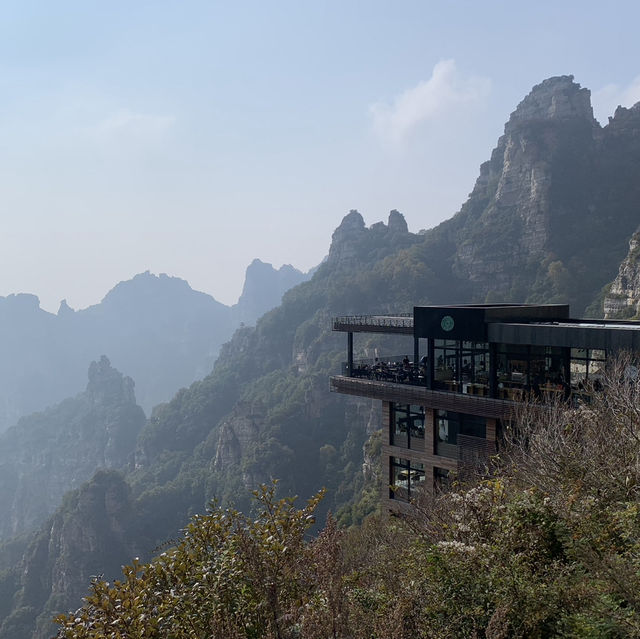 Drinking iced latte on top of Baishi Mountain