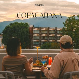 "Copacabana Rooftop CNX", a restaurant with views of Tha Phae Gate and Doi Suthep.