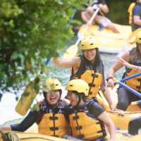 Rotorua Rafting with Coach and partners.