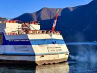 Stroll along the promenade of Lake Lugano in Switzerland