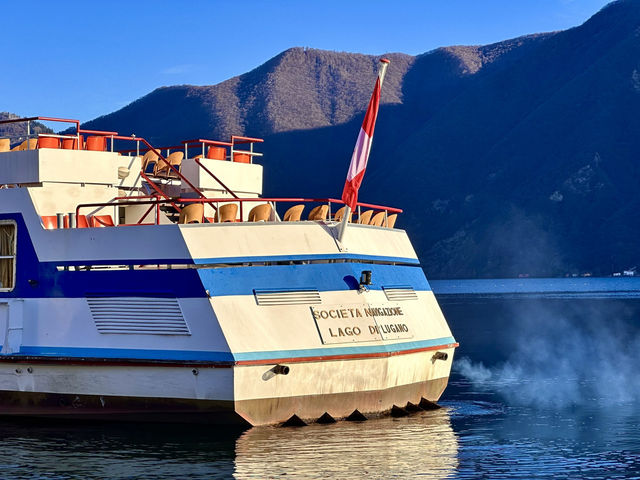 Stroll along the promenade of Lake Lugano in Switzerland