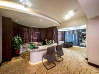 "The Promenade Hotel-Where City Convenience Meets Cozy Comfort"