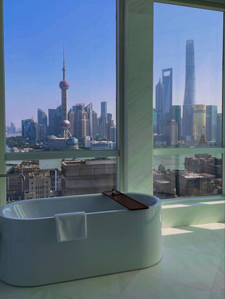 Checking into Shanghai’s most stylish spot? Let me introduce you to my stay at the Shanghai EDITION — right in the heart of the city at No. 199 Nanjing East Road! 😍 Picture this: high ceilings, clean modern design, a room that smelled amazing (honestly!) and jaw-dropping views of the Bund and Oriental Pearl Tower straight from your window. Seriously, waking up to that skyline was a dream.
What stood out most was the unique blend of luxury and location — you’re literally steps from Nanjing Road’s shopping frenzy and an easy stroll to the historic Bund. Pro tip: snag a high room for the best panorama, and time your check-in for earlier in the day since room availability can be hit or miss. I also recommend packing some earplugs — Shanghai is a buzz, and the soundproofing could be better for light sleepers.
A couple of practical tips: Communicating your needs clearly at the front desk pays off, as service can get a bit busy. If you’re craving some city energy without sacrificing comfort, the EDITION delivers. Take advantage of their chic rooftop for an evening cocktail — the view is unmatched!
Getting around? The metro is your best friend; People’s Square station is just minutes away. For meals, you’ll find plenty of local eats around Nanjing Road, or just indulge at the hotel’s own restaurants (bonus: room service is solid).
#ShanghaiStay #BundView #TravelTips #LuxuryHotel