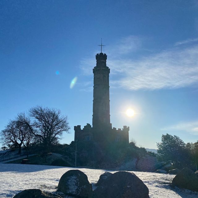 Carlton hill Edinburgh snow , night and day view up in a mountain 