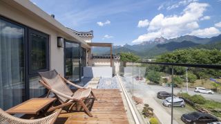 Encounter tranquility amidst the serene mountains and waters