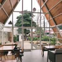 THERE ARE OUTDOOR AREAS AROUND IT FRONT, SIDE, AND BACK