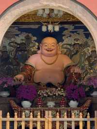 Serene temple next to busy Taikoo Li