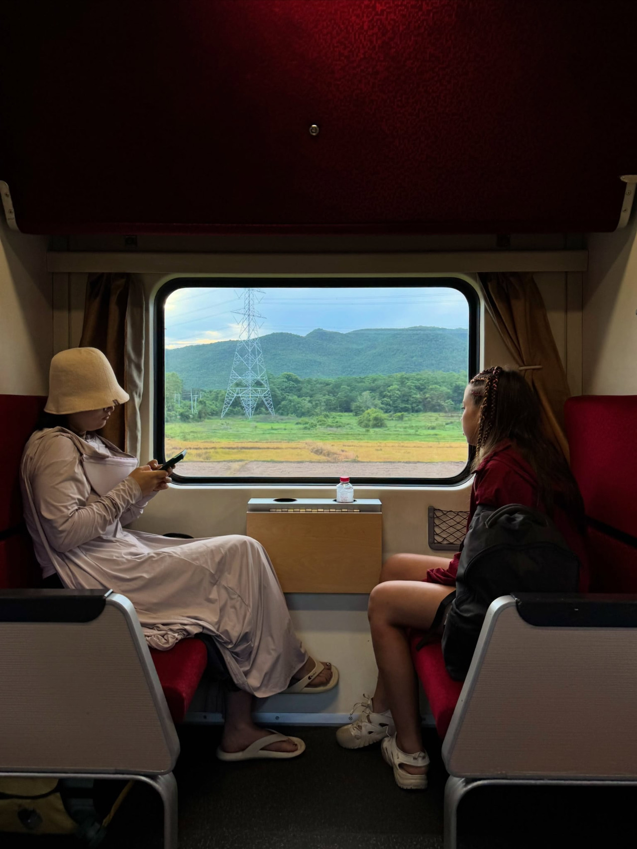 🚆🌧️ Taking the CNR train to Chiang Mai during the rainy season through the misty landscapes is absolutely refreshing for the soul.

The rainy season is one of our favorite times to take the train to Chiang Mai because the scenery along the way is filled with lush green mountains and mist. The vibe throughout the journey is so relaxing. The CNR trains offer both seated and sleeper cars. The cabins are clean, the AC is cool, and every seat comes with a power outlet.

How to get there from Bangkok:
The journey takes about 10–13 hours.
🎟️ We recommend booking your tickets in advance via the D-Ticket app, the State Railway of Thailand website, or at your local train station.
💵 Fares for a 2nd class air-conditioned sleeper start at around 1,000 THB, depending on the travel dates and bed type.

If you want to soak in the gorgeous views along the way, taking the train during the rainy season is truly worth it! 💚

  Rainy season 