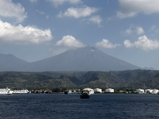 From Crater to Wave Crest: A Java Ferry Crossing Guide, surrendering your weariness to the sea at Kuta Beach in the evening.