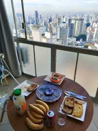 Try home made breakfast on top floor of iconic vintage building of copan with Sao Paulo skyline view
