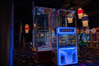 Inside OKANARAMA with Claw Games, Air Hockey, and a Neon Maze