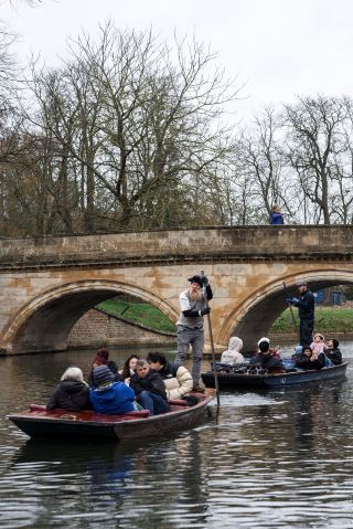 Rowing on the Cam River under a cloudy sky, encountering the true essence of the University of Cambridge