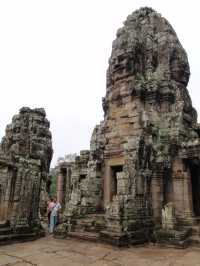 Whispers of Stone: A Morning at Bayon Temple