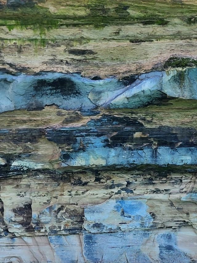 Discover the wild beauty of the crystal blue water and sandstone cliffs along Lake Superior in MI