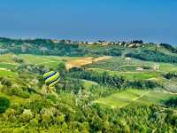 Hot air balloon ride above from Toscany sky 