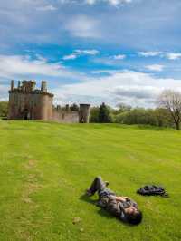 Spring Serenity: Relaxing on the Meadow at Caerlaverock Castle