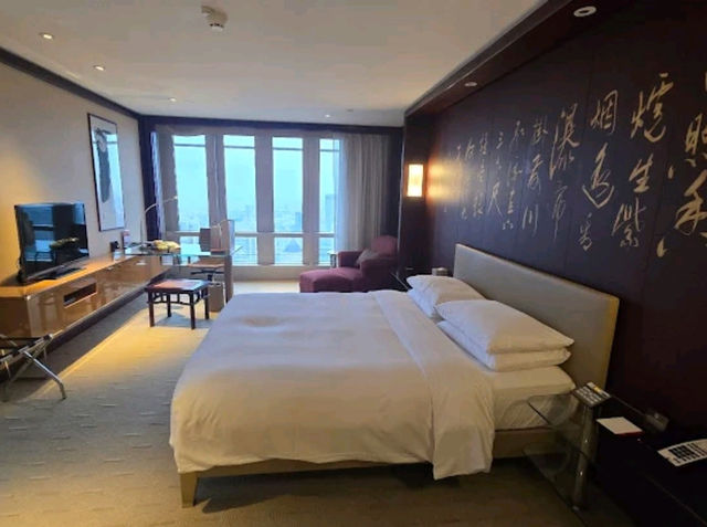 "Sky-High Luxury in the Heart of Shanghai"