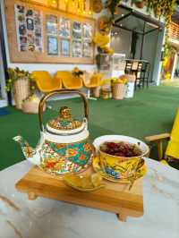 Tea Time in a Yellow Garden Café at Desaru