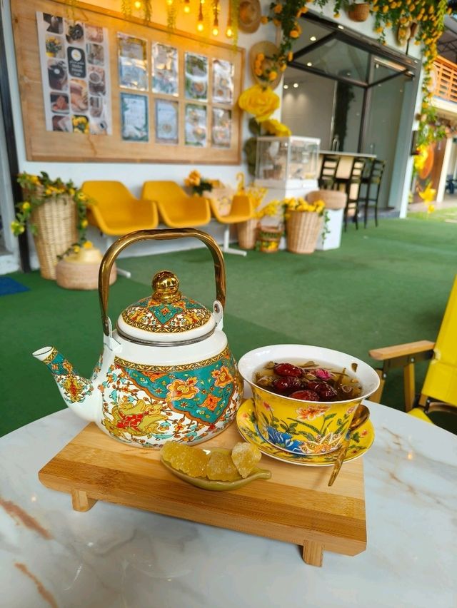 Tea Time in a Yellow Garden Café at Desaru