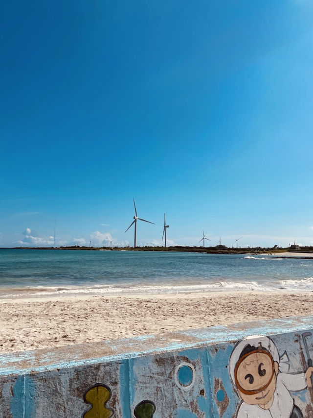 Jeju's Iconic White Sand and Emerald Waters with Island Views