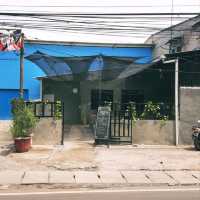 ONE OF THE COFFEE SHOPS NEAR A TRANSJAKARTA BUS STOP