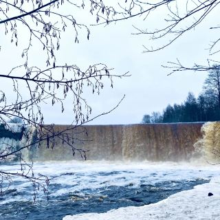 Waterfall in the Melting Snow.