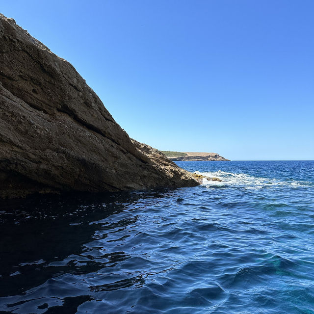 Paradise Found: A Journey to Cala Bassa’s Pristine Blue Waters