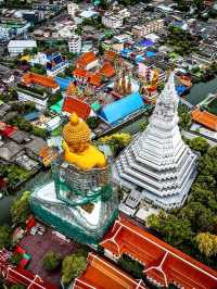 Golden Buddha at Wat Paknam Phasi Charoen, Bangkok: A Towering Symbol of Thai Faith