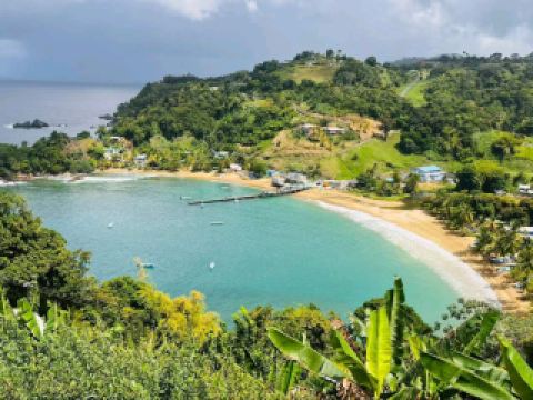 #winterescape Embark on a Mythical Adventure at Anthea’s Cave 🏝️🧭  
Discover the hidden allure of Anthea’s Cave in Protaras, a secret gem set against the shimmering blue coastline perfect for outdoor adventurers and myth-lovers alike! Soak in views where the sea meets modern life—a place where legends of Cyclops swirl and cruise ships sail right by.

Your ideal trail starts at the parking area, leading you through fragrant pines and rocky views toward the cave. Along the way, pause and snap photos—especially with the sea framed by white houses and anchored ships for a truly “Nature-Vision” shot. You’ll want a close-up of the cave’s entrance, framed by ancient stone and leafy trees, as well as panoramic coastline shots dotted with modern architecture in the distance.

Must-do: Explore the cave’s nooks, feeling the mythic energy, and climb carefully around for sunrise or late-afternoon golden hour light. Spot the distant cargo and cruise ships for a dynamic mix of natural and urban visuals in your photos. For the best Insta-worthy angle, stand in the cave with the sun streaming in and blue sea behind you—unbeatable!

Visiting tips: Set out during mid-morning for bright sun and fewer crowds. Wear sturdy shoes—the path is rocky, and shade is limited. Bring water and stay aware of loose stones near the cave. If you're after serenity, avoid weekends when locals love to picnic here.

Precautions: There are some uneven surfaces, and little to no railings, so take care, especially if you’re with children.

#Protaras #AntheasCave #SeasideAdventure #NaturePhotography #CyprusTravel