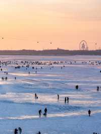 震撼！冰凍期松花江美成天然滑雪場，日落+摩天輪絕了！