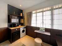 Interiors are clean, minimalist, and smart, featuring comfortable bedding, smart TVs, and en-suite