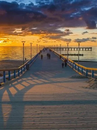 Palanga — The Lithuanian Seaside Town Where Amber Washes Ashore and the Pier Stretches Into the Suns