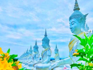 The Serene Realm of White Buddha Statues at Wat Phra Phutthabat Namthip